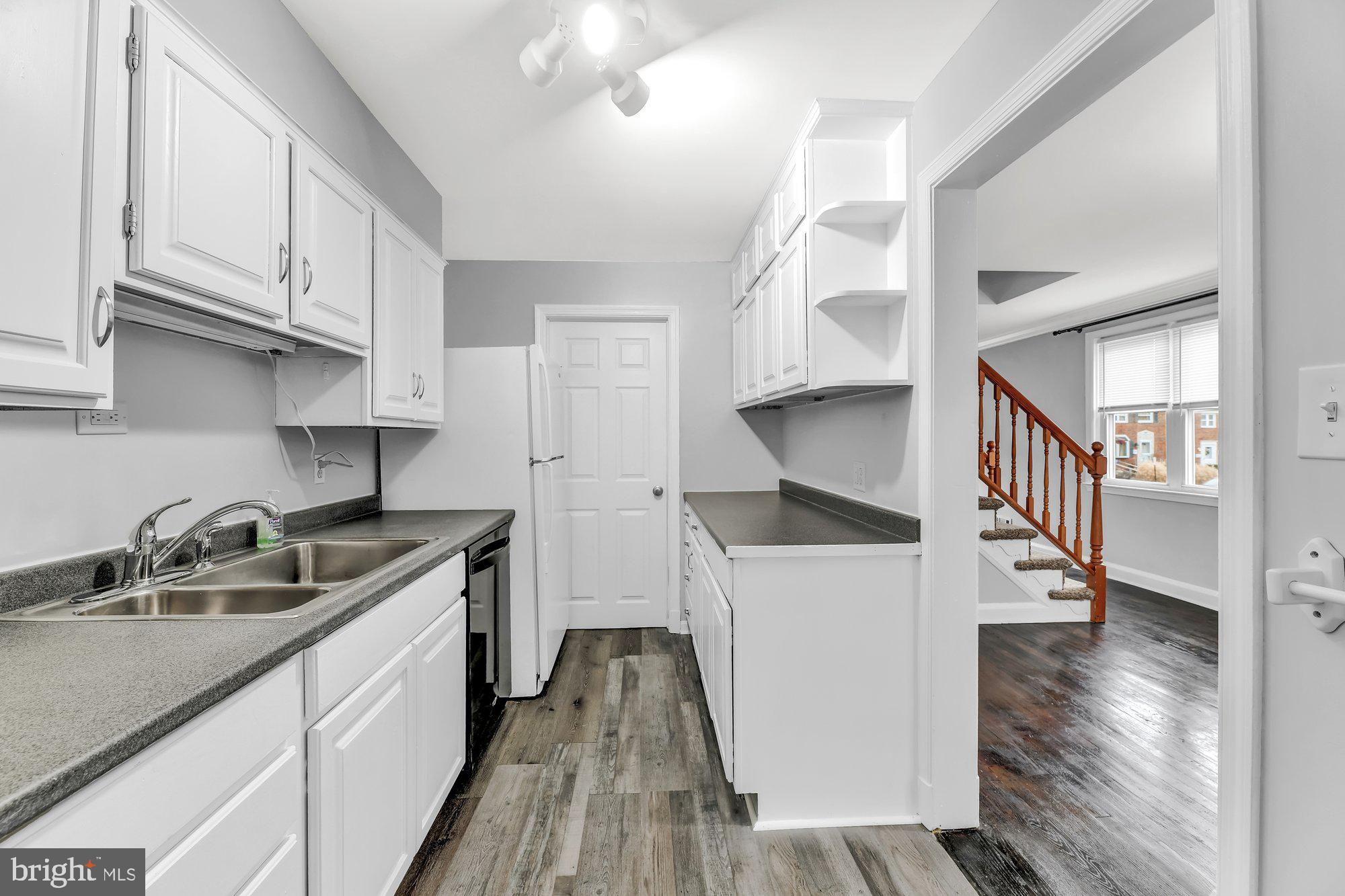 1210 Deanwood Road Baltimore, MD 21234 - Photo 15 of 33 Galley kitchen has countertop & cabinet space!