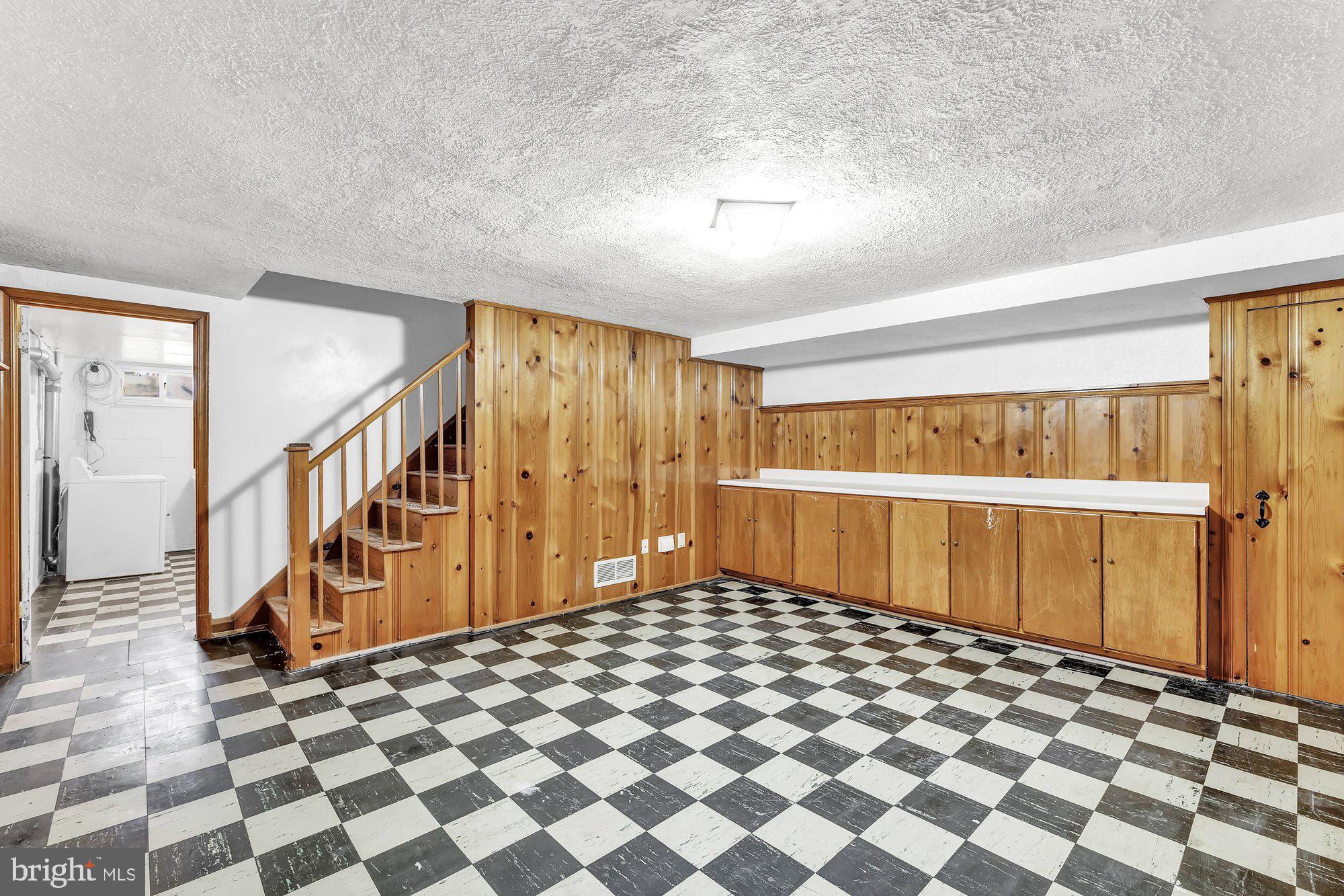 1210 Deanwood Road Baltimore, MD 21234 - Photo 25 of 33 WARM toned paneling makes for cozy area