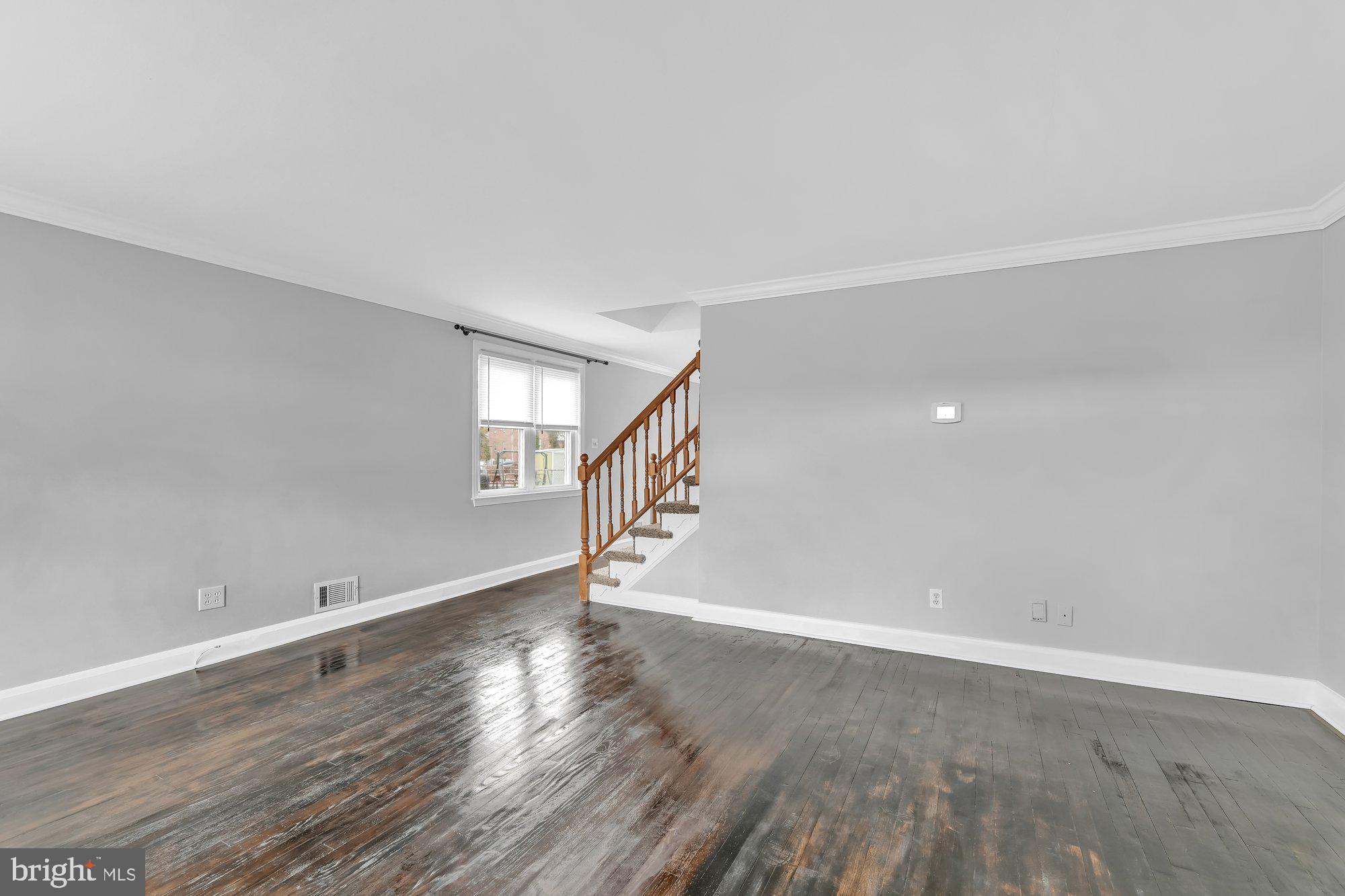 1210 Deanwood Road Baltimore, MD 21234 - Photo 8 of 33 Staircase to Upper Level between LR & DR