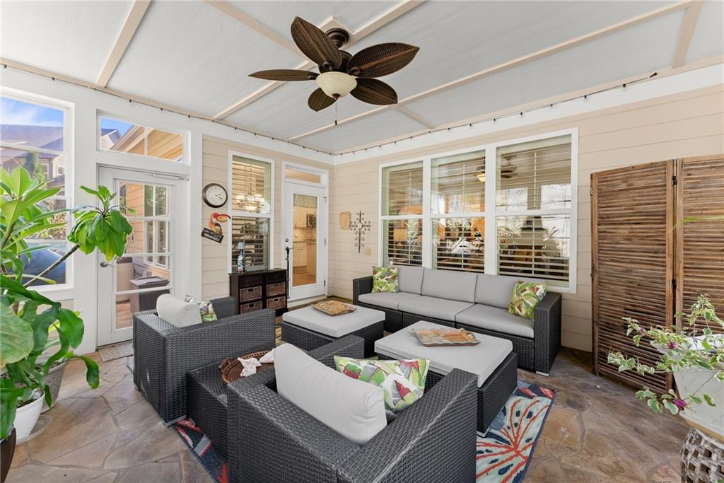 3476 Locust Cove Road Gainesville, GA 30504 - Photo 11 of 71 a living room with furniture and a large window
