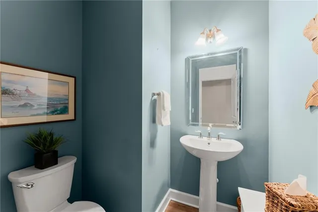 a view of a street with a bench in front of it