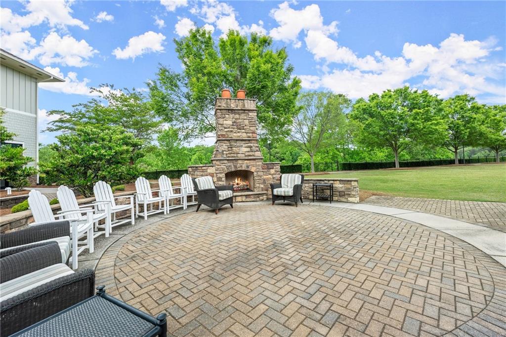 3476 Locust Cove Road Gainesville, GA 30504 - Photo 38 of 71 a view of backyard with seating area and trees