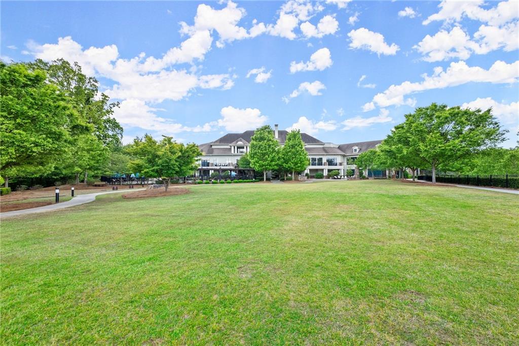 3476 Locust Cove Road Gainesville, GA 30504 - Photo 41 of 71 a view of yard with swimming pool and green space