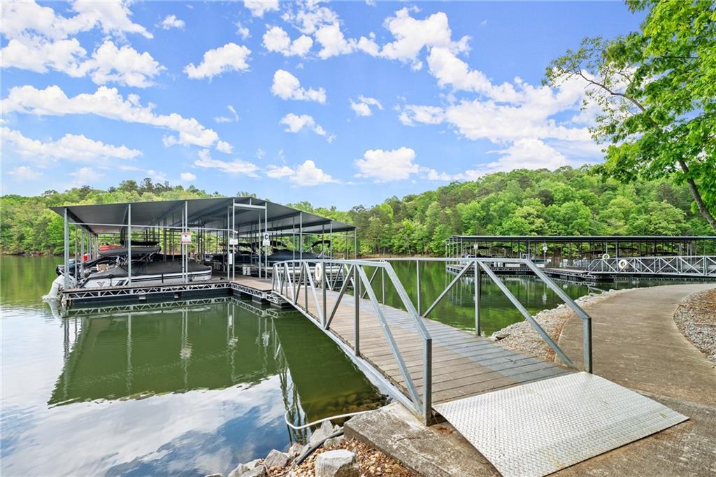 3476 Locust Cove Road Gainesville, GA 30504 - Photo 57 of 71 a view of a swimming pool with a lounge chair