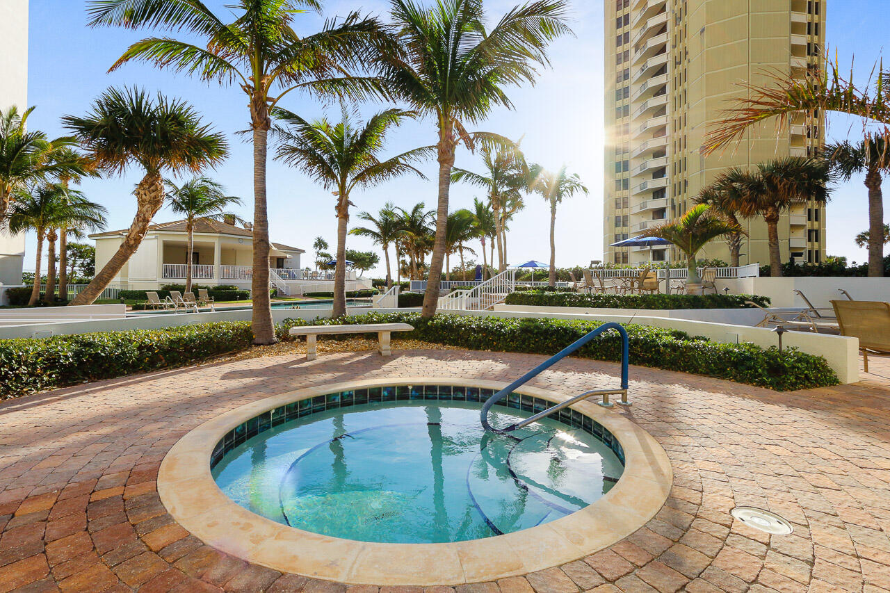 3000 North Ocean Drive, Unit 17D Riviera Beach, FL 33404 - Photo 24 of 34 a view of a house with swimming pool and sitting area