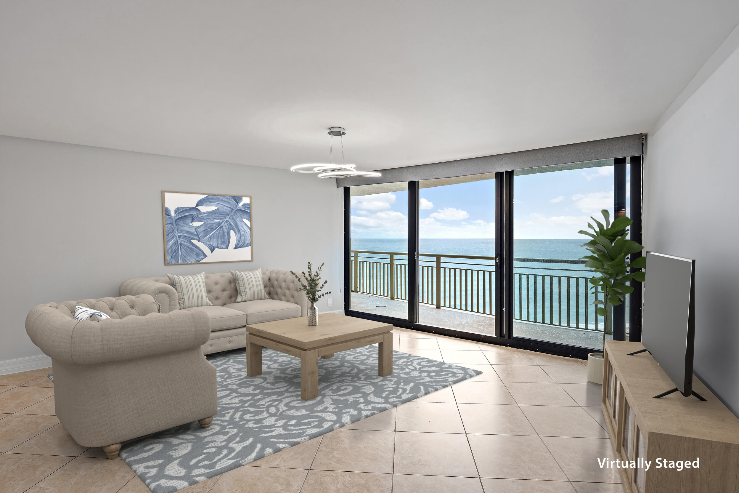 3000 North Ocean Drive, Unit 17D Riviera Beach, FL 33404 - Photo 3 of 34 a living room with furniture and a floor to ceiling window
