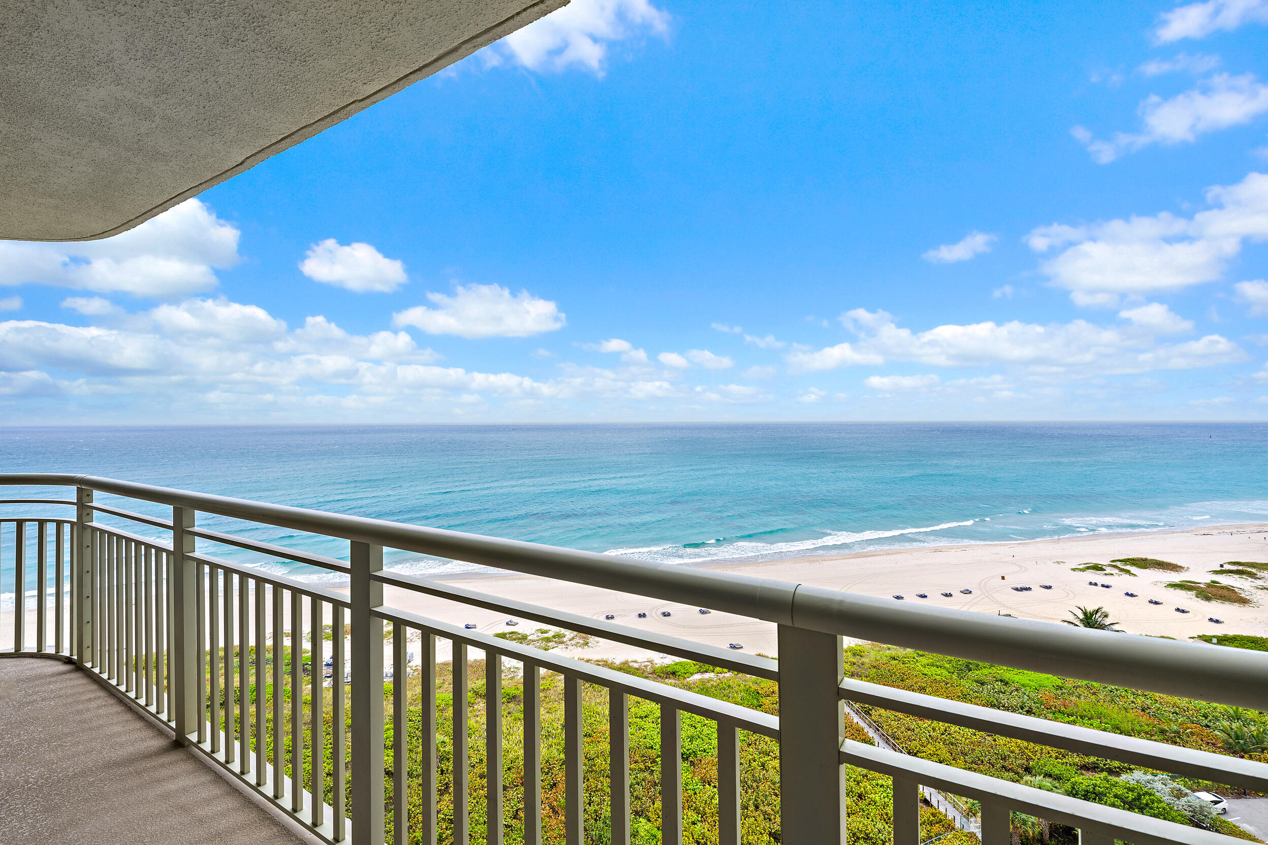 3000 North Ocean Drive, Unit 17D Riviera Beach, FL 33404 - Photo 4 of 34 a view of a balcony with an ocean view