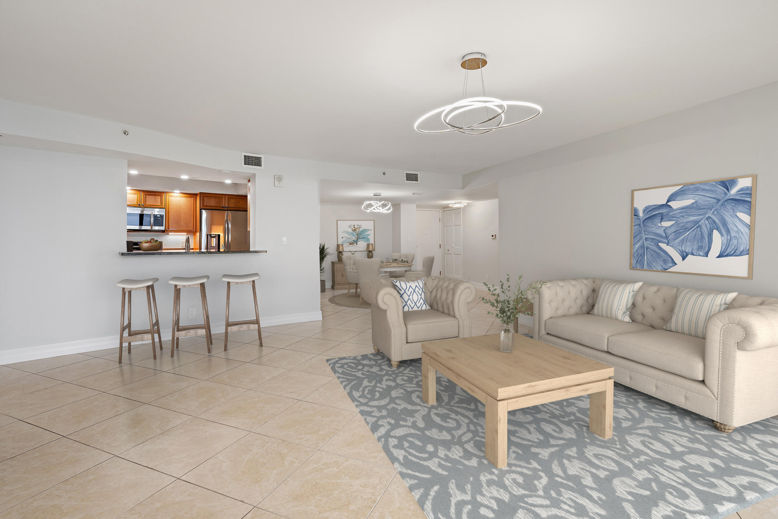 3000 North Ocean Drive, Unit 17D Riviera Beach, FL 33404 - Photo 6 of 34 a living room with furniture and a large mirror next to a window
