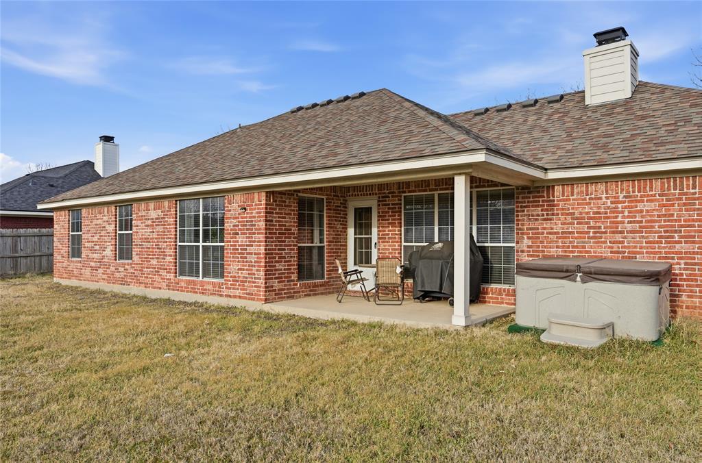 10504 Whitney Trace Drive Waco, TX 76708 - Photo 21 of 24 a front view of a house with yard and seating space