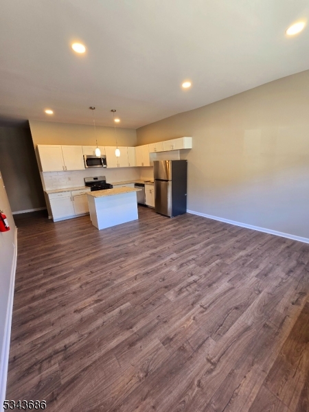 308 North 2nd Street Harrison, NJ 07029 - Photo 3 of 10 a view of kitchen with cabinets stainless steel appliances with wooden floor
