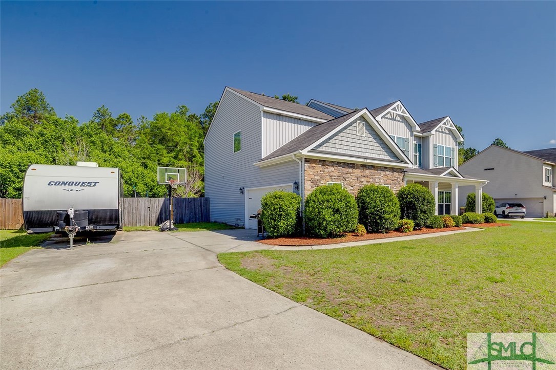 106 Cedar Ridge Drive Guyton, GA 31312 - Photo 2 of 39 Exterior Front Driveway