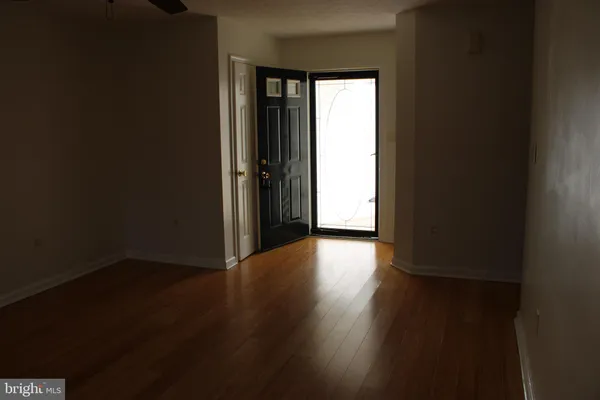 a kitchen with stainless steel appliances granite countertop a stove and a microwave