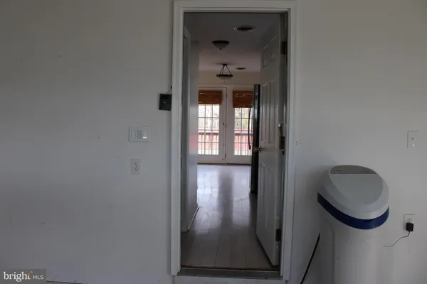a view of a livingroom with wooden floor