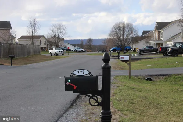 a car parked in front of a house