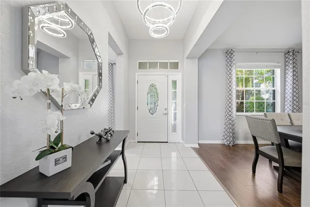 a view of a livingroom with furniture and a window