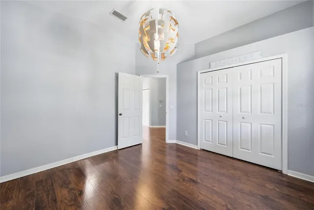 a view of entryway with wooden floor
