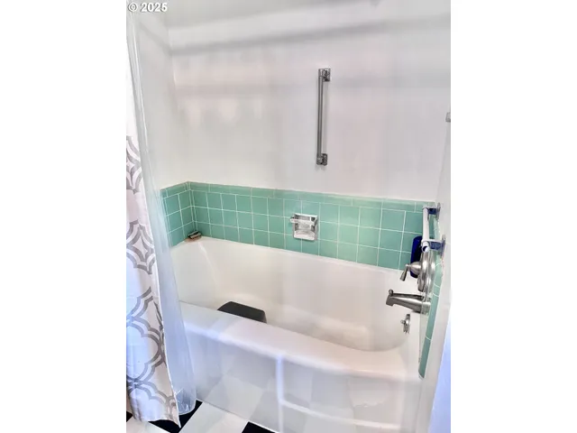 a bathroom with a sink and a bathtub