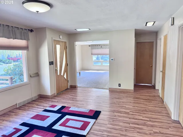 a room with window and wooden floor