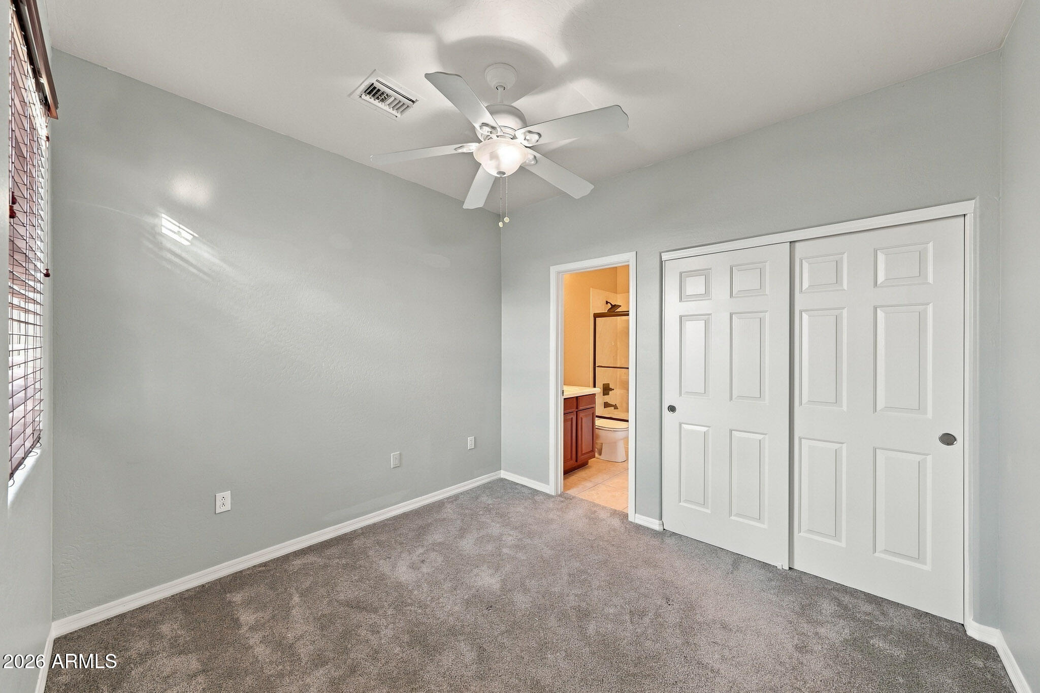 3935 East Rough Rider Road, Unit 1014 Phoenix, AZ 85050 - Photo 15 of 35 Bedroom 1
