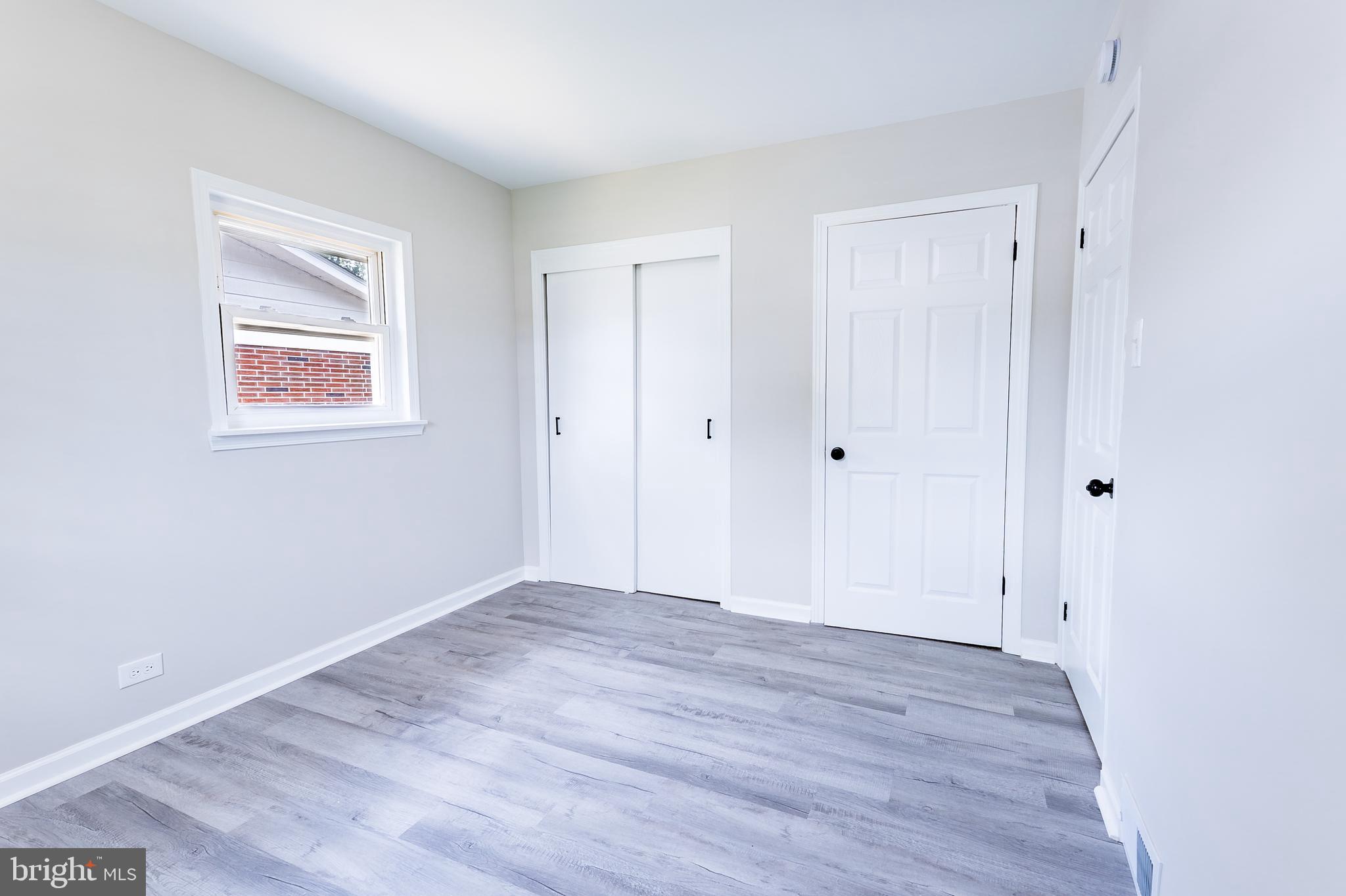 1714 Elliott Avenue Bethlehem, PA 18018 - Photo 18 of 39 a view of an empty room with wooden floor