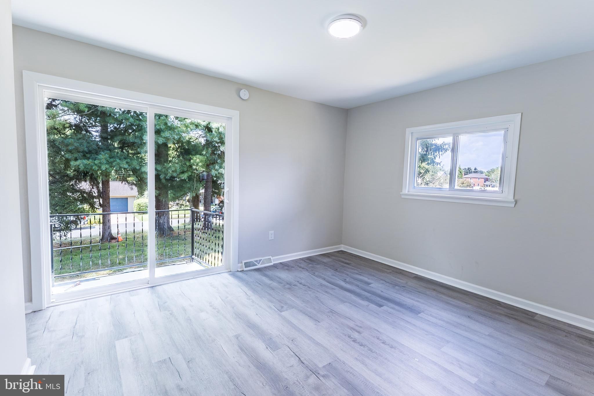 1714 Elliott Avenue Bethlehem, PA 18018 - Photo 8 of 39 a view of empty room with wooden floor and fan