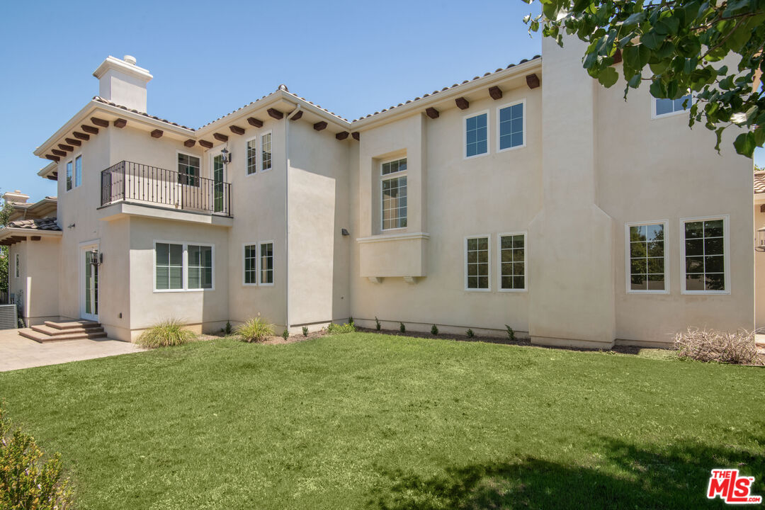 18326 Columbus Circle Tarzana, CA 91356 - Photo 34 of 34 a view of front of house with yard