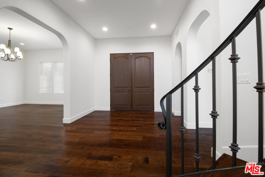 18326 Columbus Circle Tarzana, CA 91356 - Photo 5 of 34 a view of entryway with wooden floor