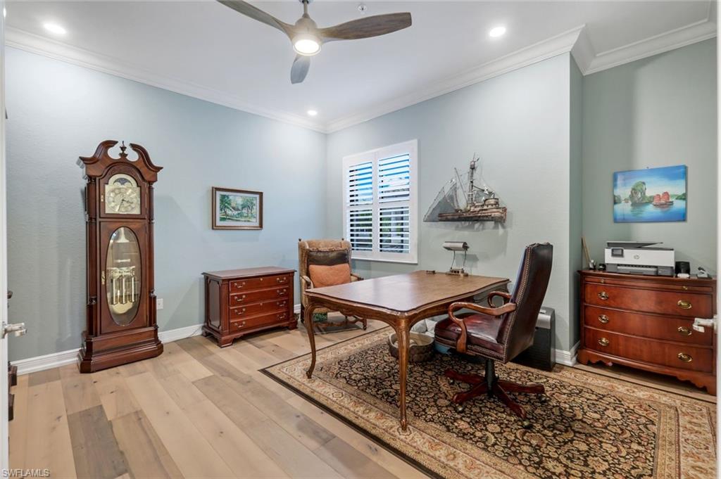 2488 Breakwater Way, Unit 201 Naples, FL 34112 - Photo 23 of 48 a workspace with furniture