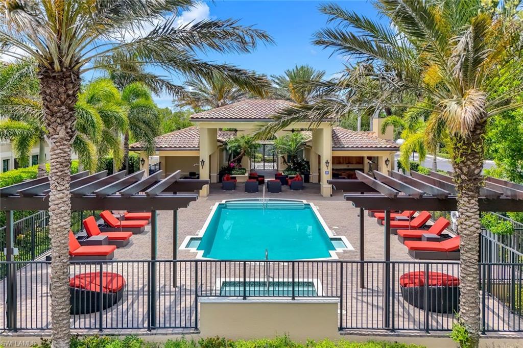 2488 Breakwater Way, Unit 201 Naples, FL 34112 - Photo 40 of 48 a outdoor space with swimming pool and furniture