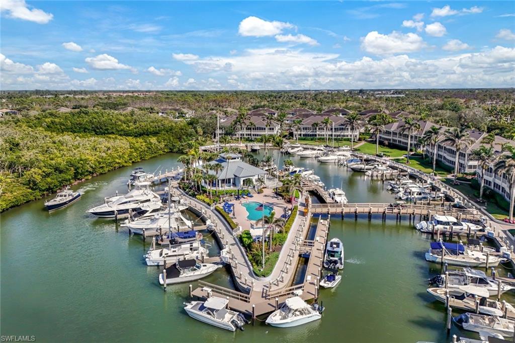 2488 Breakwater Way, Unit 201 Naples, FL 34112 - Photo 43 of 48 an aerial view of a city with lots of residential buildings lake and ocean view