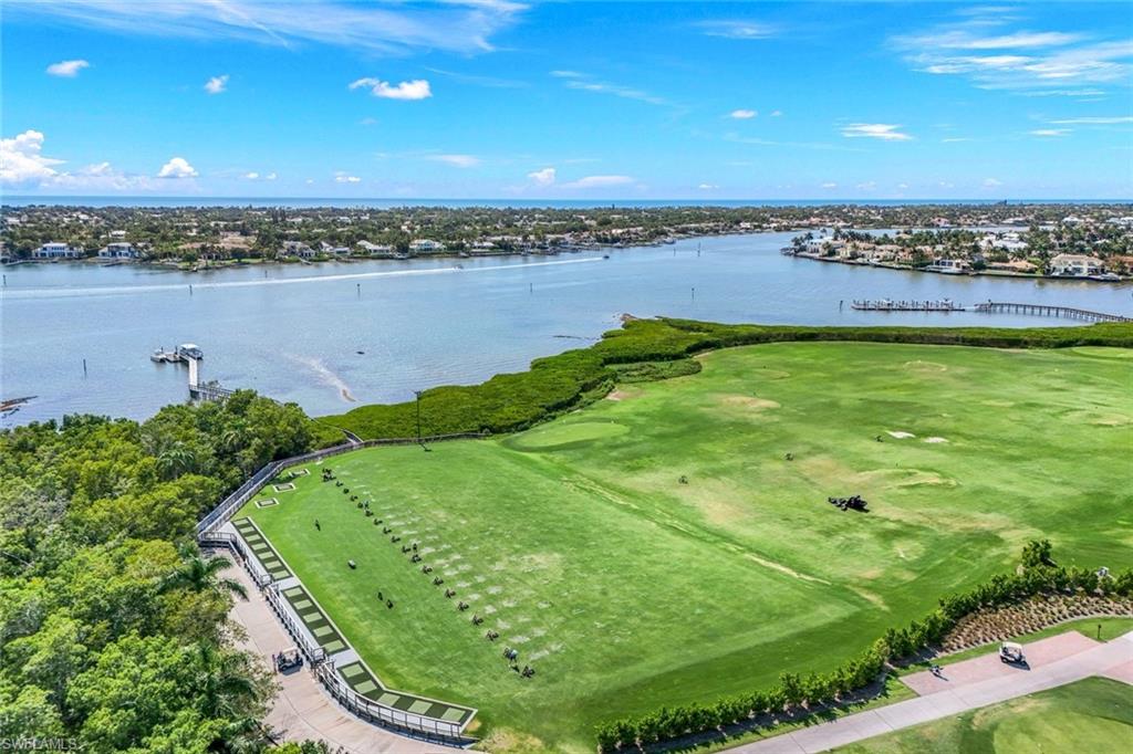 2488 Breakwater Way, Unit 201 Naples, FL 34112 - Photo 48 of 48 a view of a city and a lake