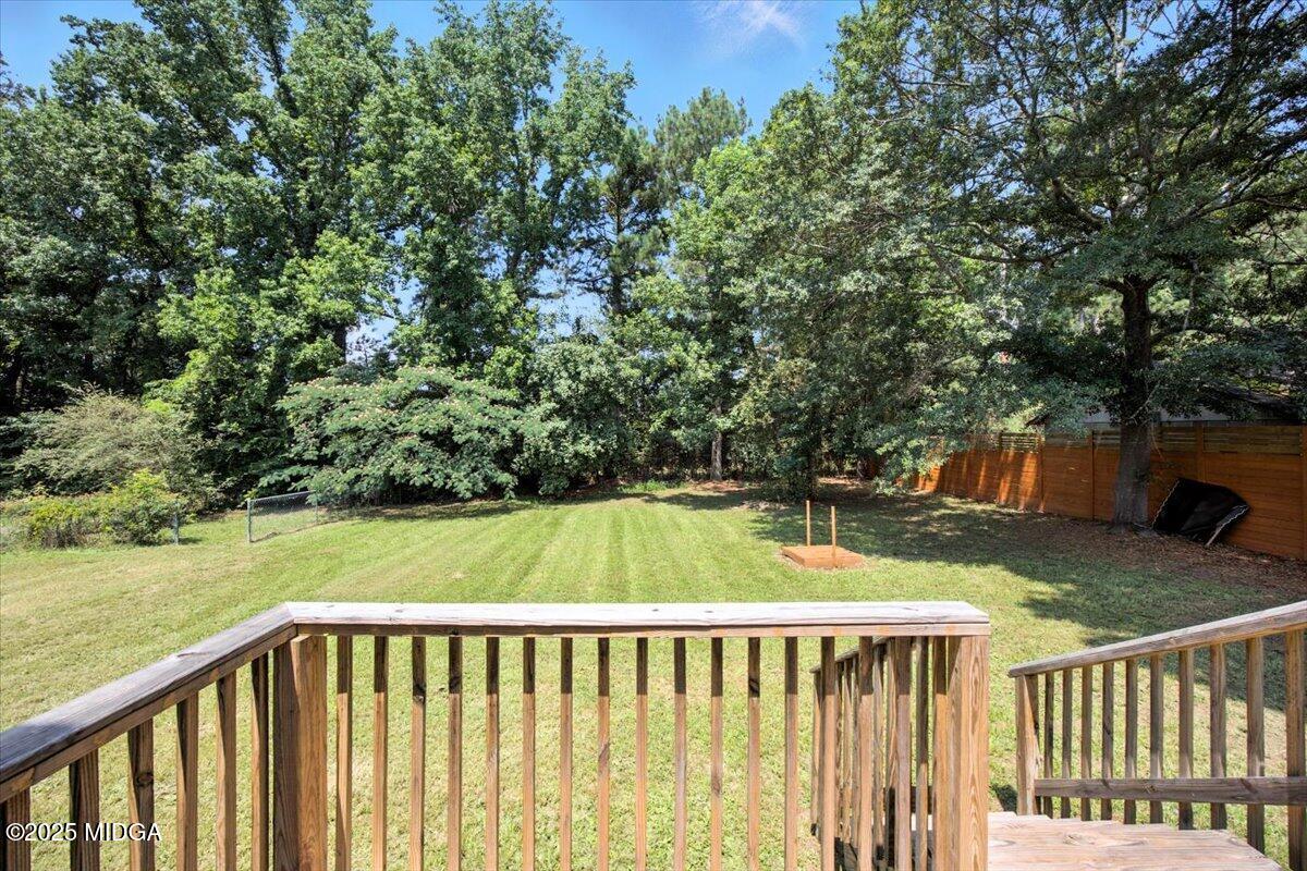 4801 Wilson Road Macon, GA 31206 - Photo 17 of 18 a view of backyard with deck and garden