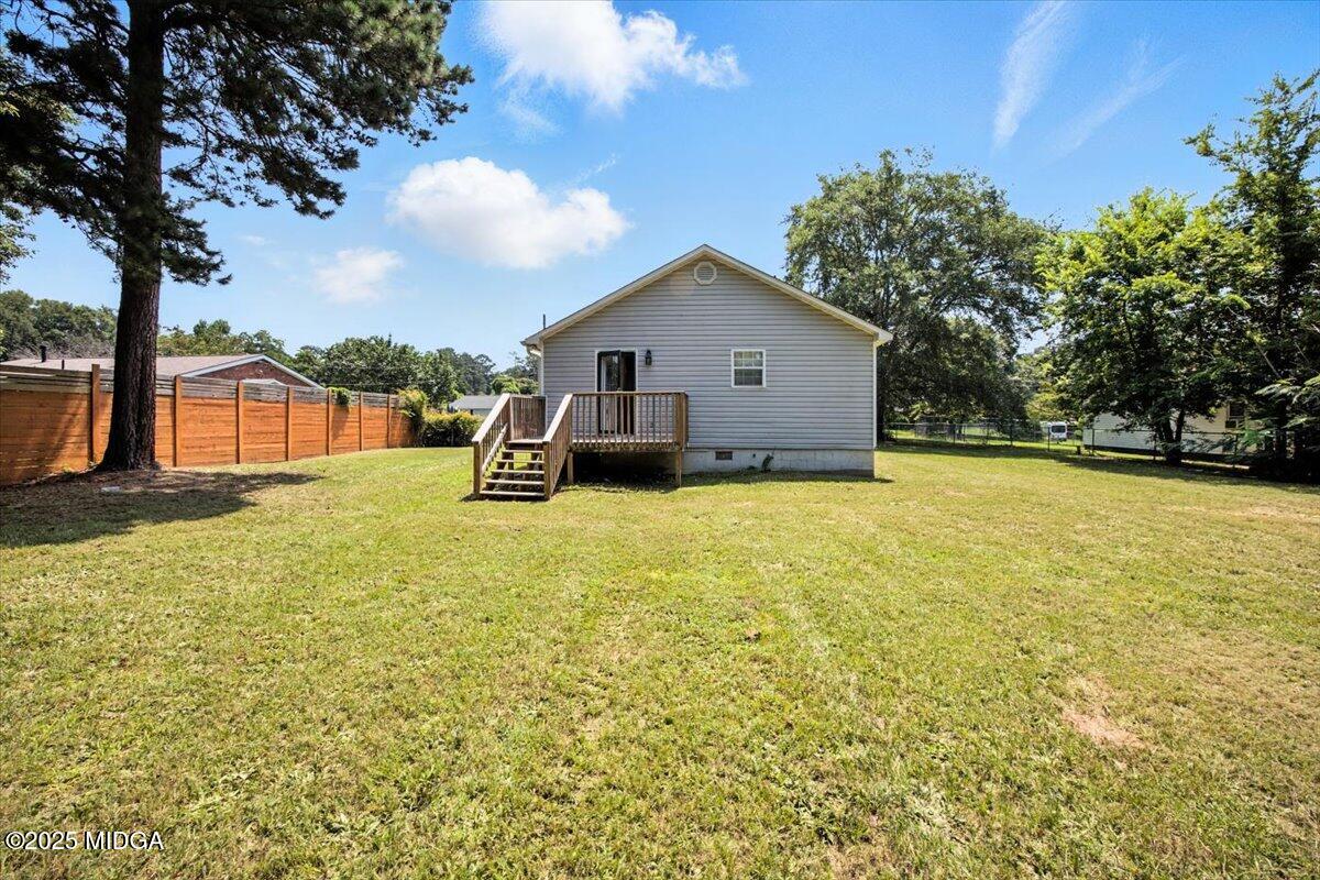 4801 Wilson Road Macon, GA 31206 - Photo 18 of 18 a view of a house with a yard