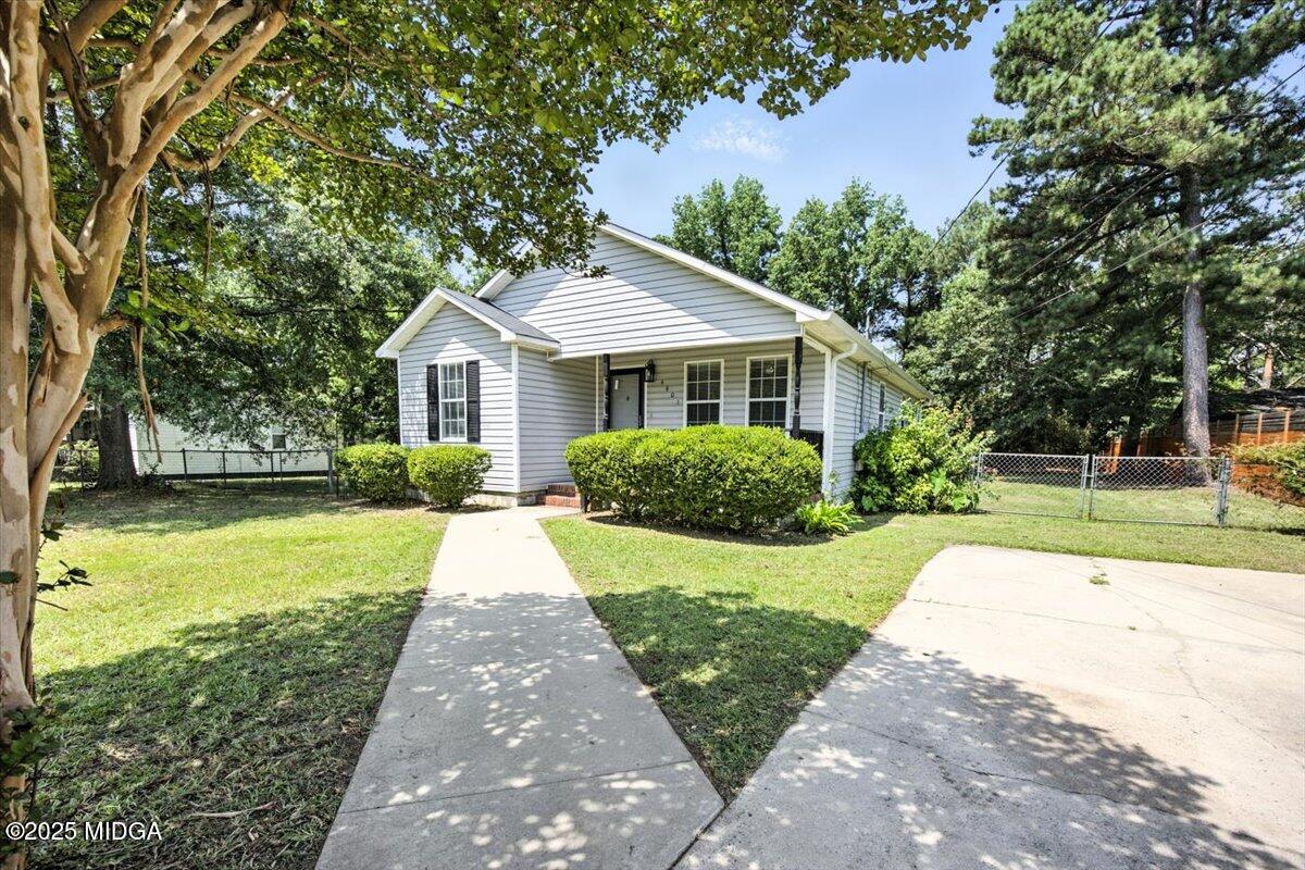 4801 Wilson Road Macon, GA 31206 - Photo 2 of 18 a front view of a house with yard