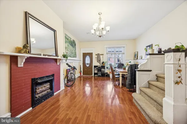 a view of a livingroom with furniture and a fireplace