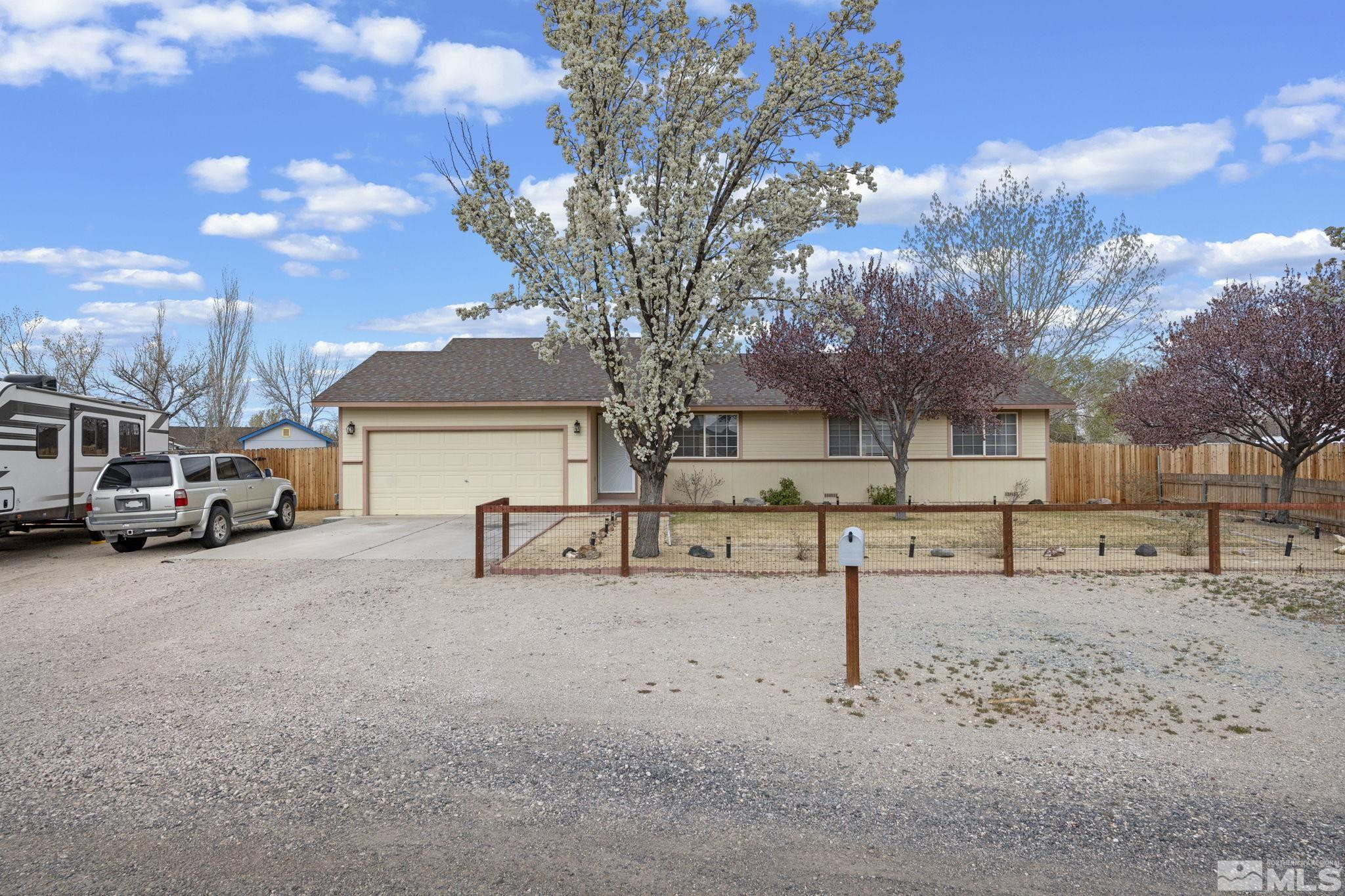 1240 Lattin Road Fallon, NV 89406 - Photo 2 of 34 a view of street with parked cars