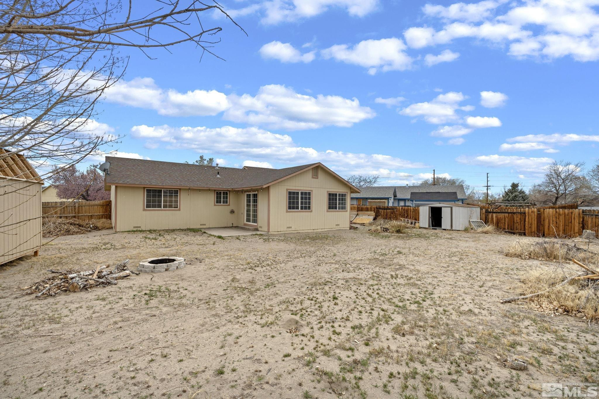 1240 Lattin Road Fallon, NV 89406 - Photo 32 of 34 a front view of a house with a yard