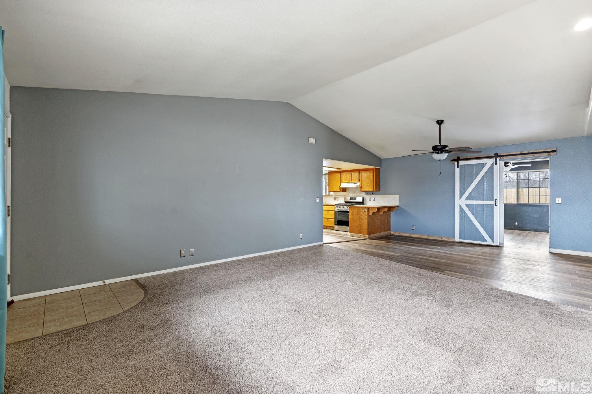 1240 Lattin Road Fallon, NV 89406 - Photo 6 of 34 an empty room with windows and entrance