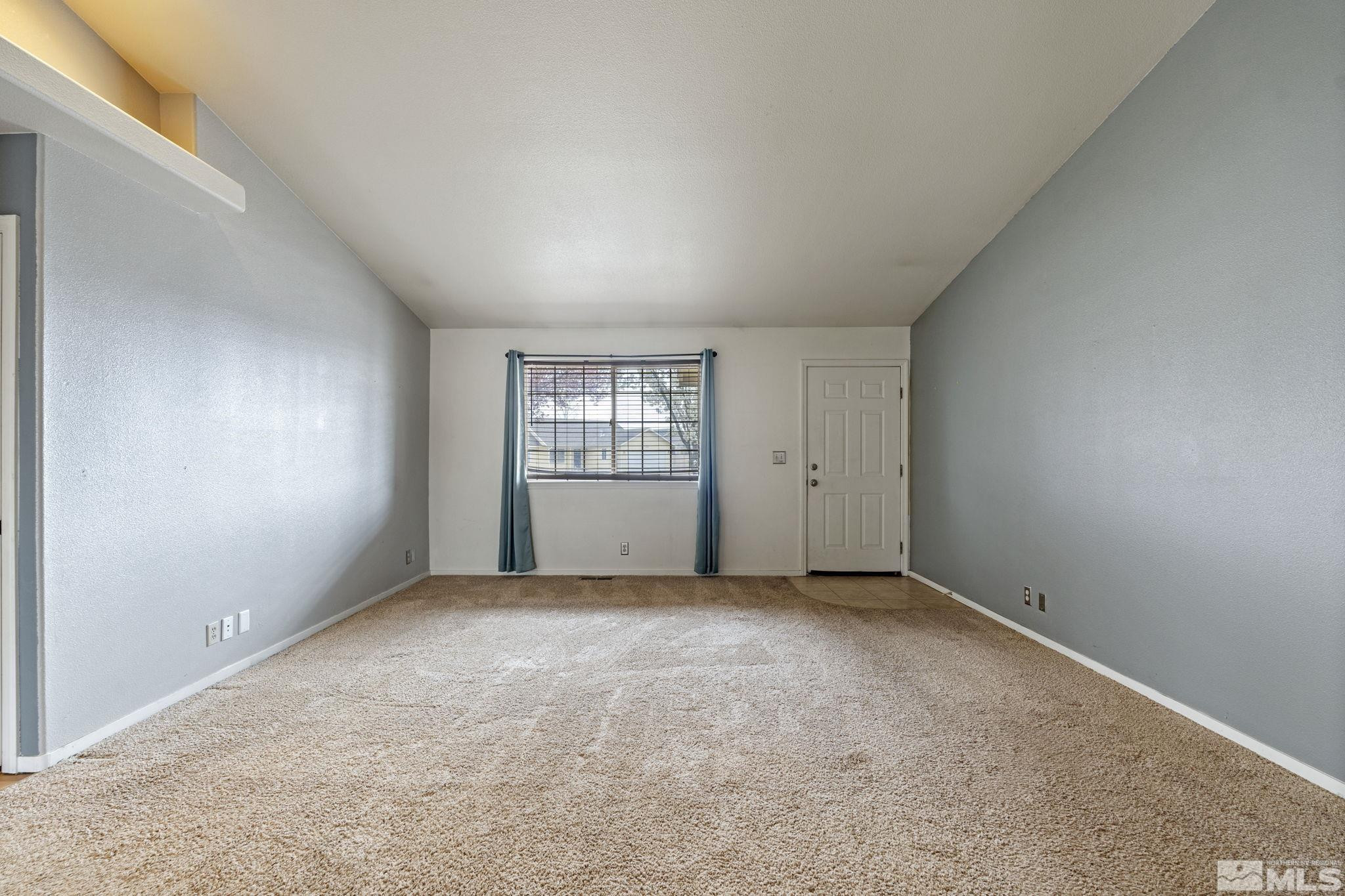 1240 Lattin Road Fallon, NV 89406 - Photo 7 of 34 an empty room with windows