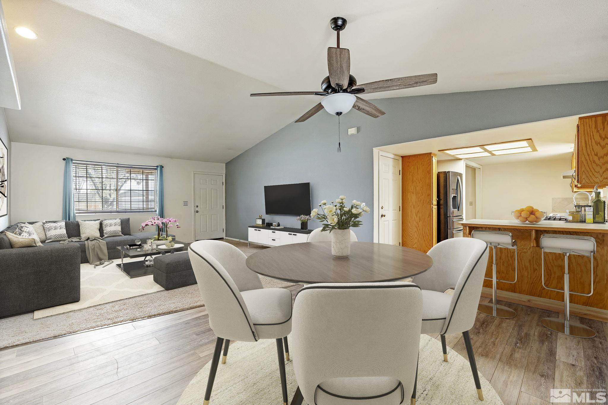 1240 Lattin Road Fallon, NV 89406 - Photo 8 of 34 a view of a dining room with furniture window and wooden floor