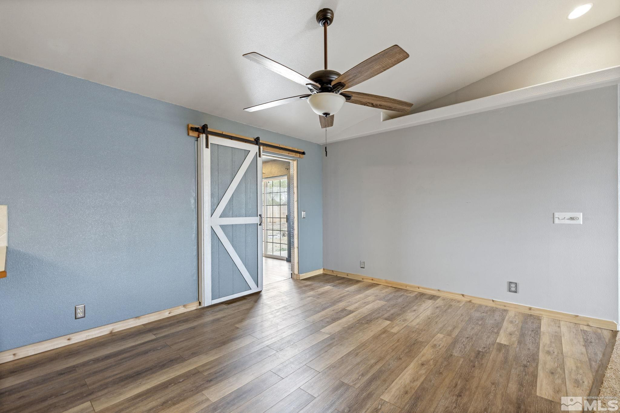 1240 Lattin Road Fallon, NV 89406 - Photo 10 of 34 wooden floor in an empty room with a window