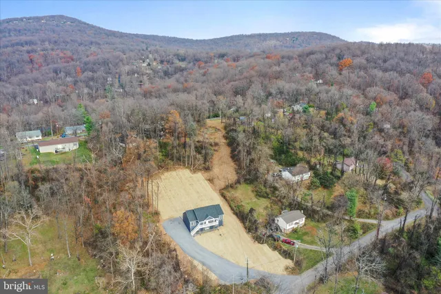 a view of a house with a large window