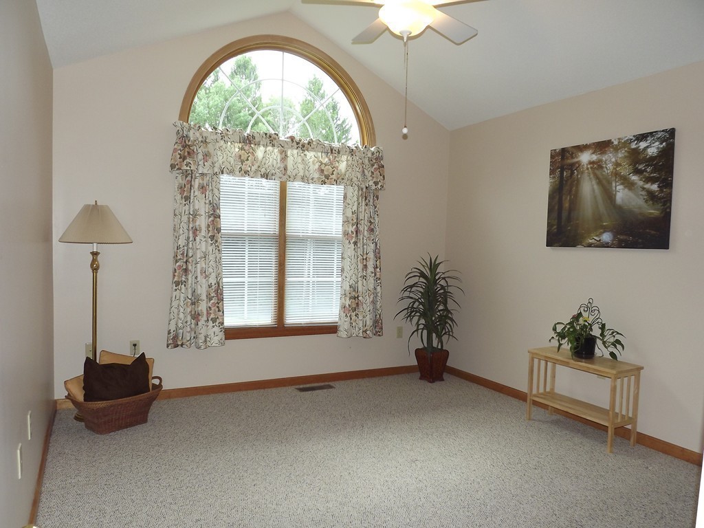 78 Bogan Road Monson, MA 01057 - Photo 15 of 20 a living room with furniture and a large window