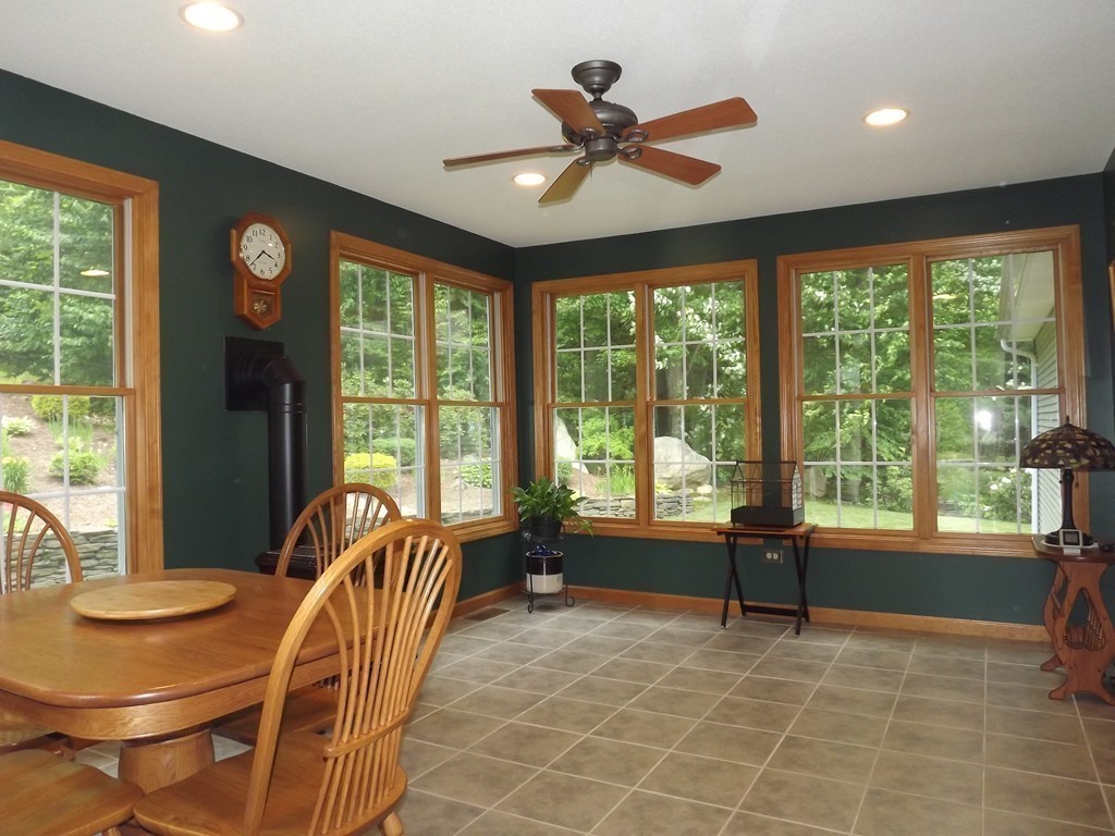 78 Bogan Road Monson, MA 01057 - Photo 16 of 20 a living room with furniture and a large window