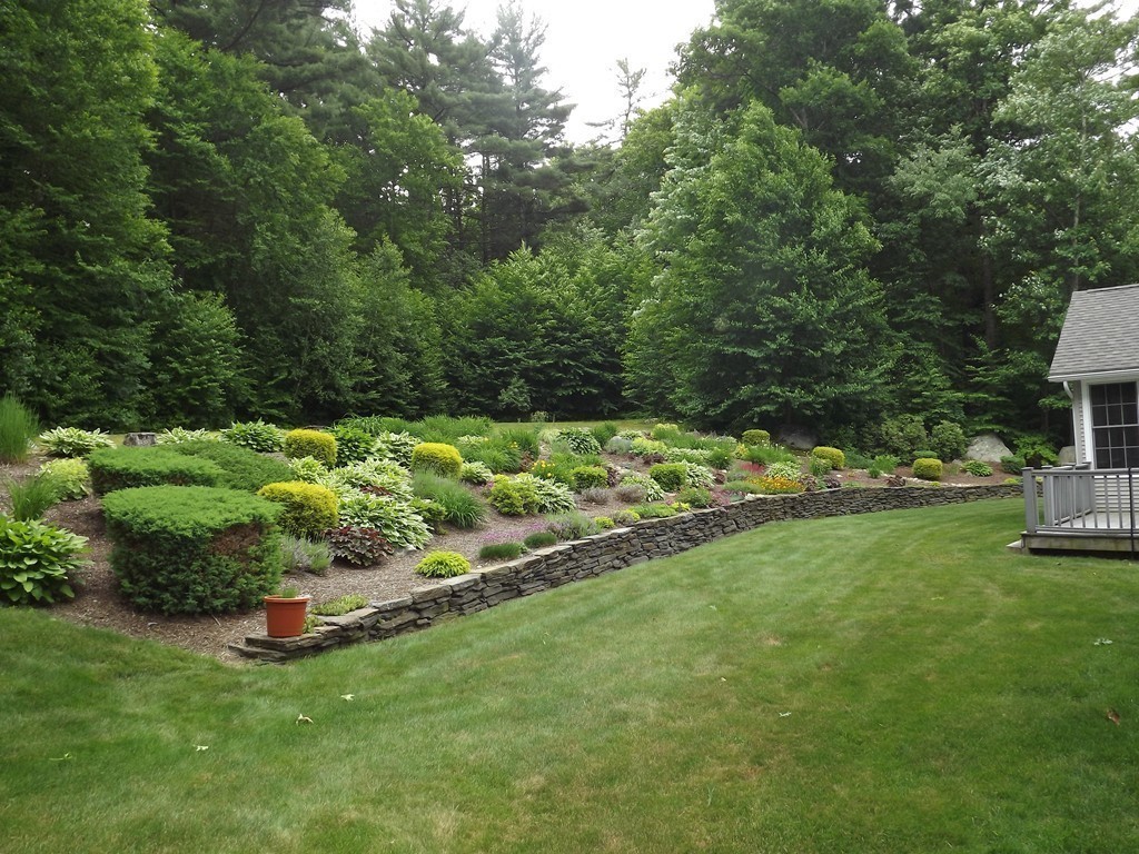 78 Bogan Road Monson, MA 01057 - Photo 19 of 20 a garden with lots of trees