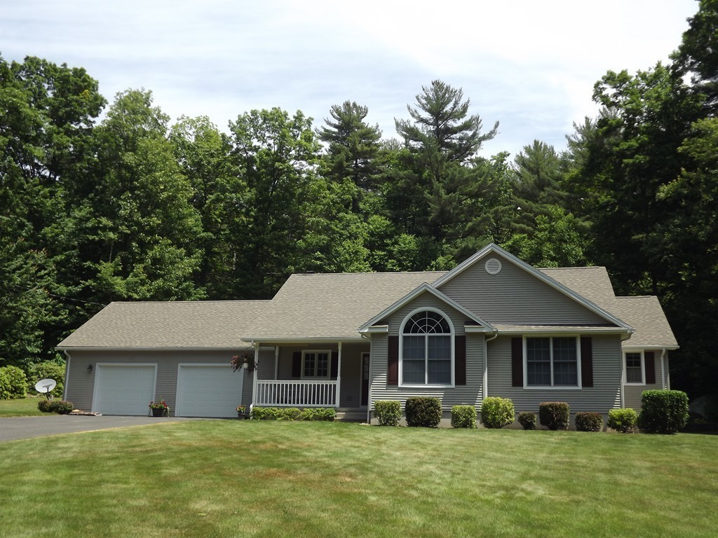78 Bogan Road Monson, MA 01057 - Photo 20 of 20 a front view of a house with garden