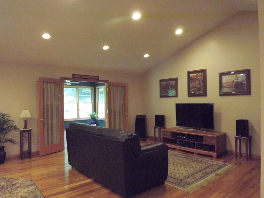78 Bogan Road Monson, MA 01057 - Photo 8 of 20 a living room with furniture and a flat screen tv