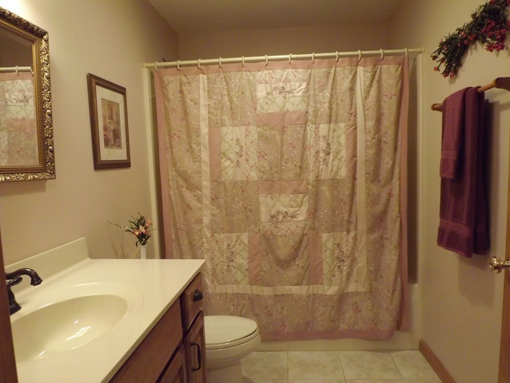 78 Bogan Road Monson, MA 01057 - Photo 10 of 20 a bathroom with a sink toilet and shower