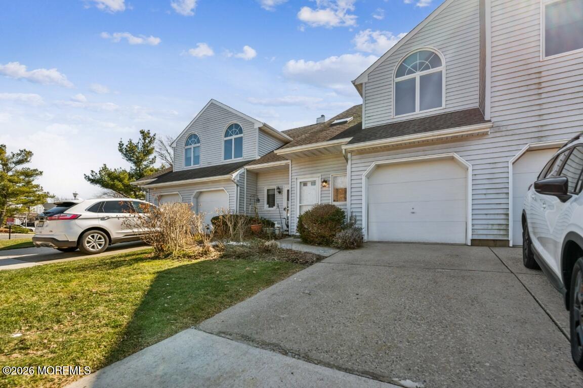 a house view with a garden space