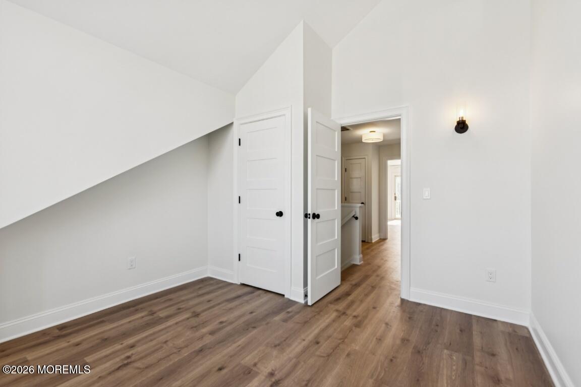 16 Shore Drive Long Branch, NJ 07740 - Photo 12 of 26 a view of a hallway with wooden floor